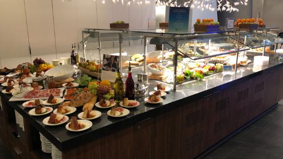 The buffet at LAX includes panettone french toast and a farro salad with fresh herbs.