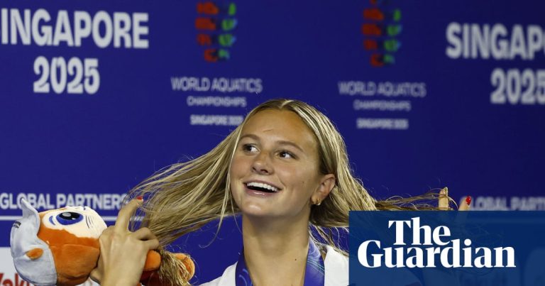 Summer McIntosh wins third gold of swimming worlds as Marchand dazzles