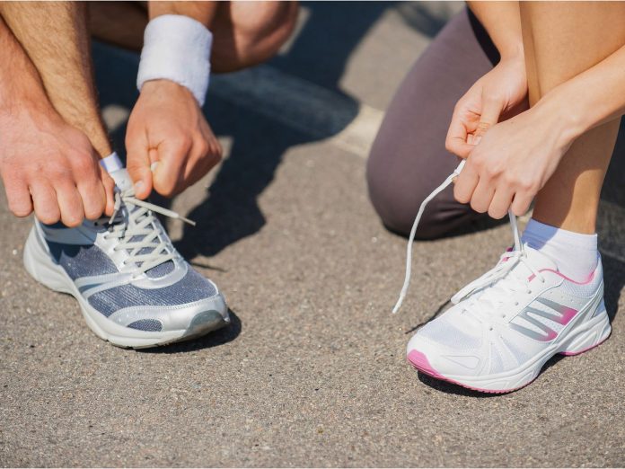 Running-shoes-sneakers-lace-tying-concrete-sidewalk-race-GettyImages-493768733-g-stockstudio-(cropped).jpg
