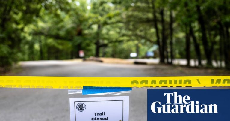 Arkansas police say suspect admitted killing couple hiking with daughters