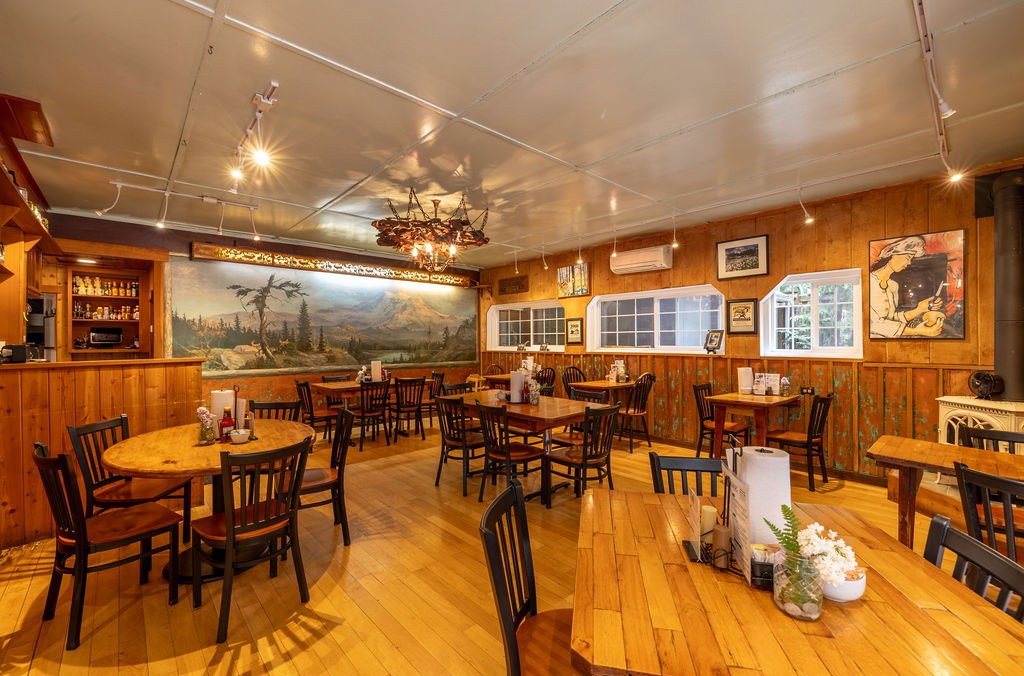 A wood-filled restaurant dining room.