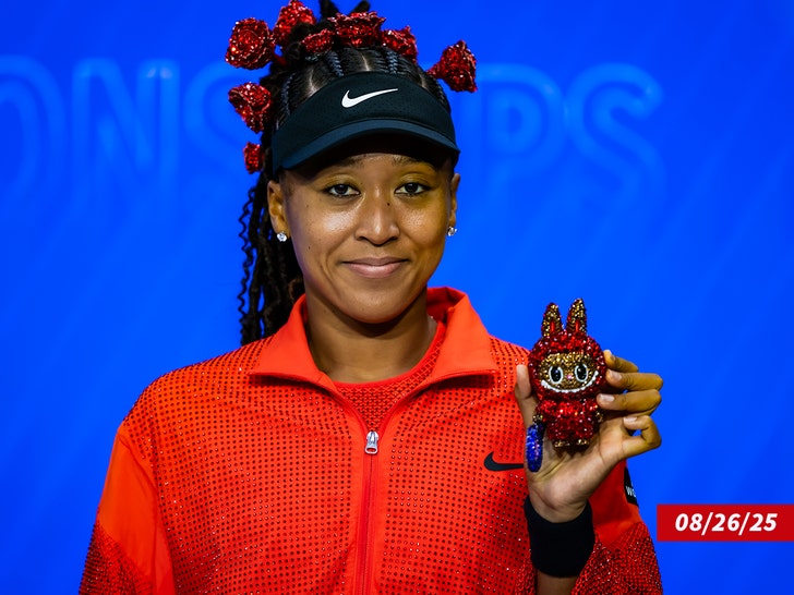 Naomi Osaka and one of her labubus getty