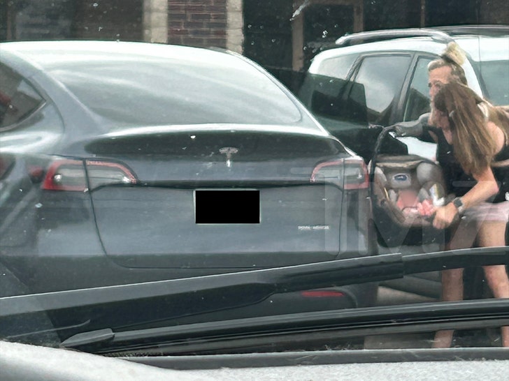 Abby and Britany conjointed twins out and about with baby tmz 2